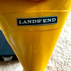 Yellow knee high rain boots